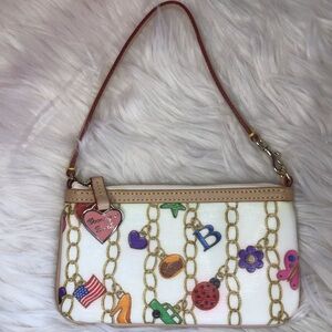 Dooney large wristlet wallet vintage charms pattern